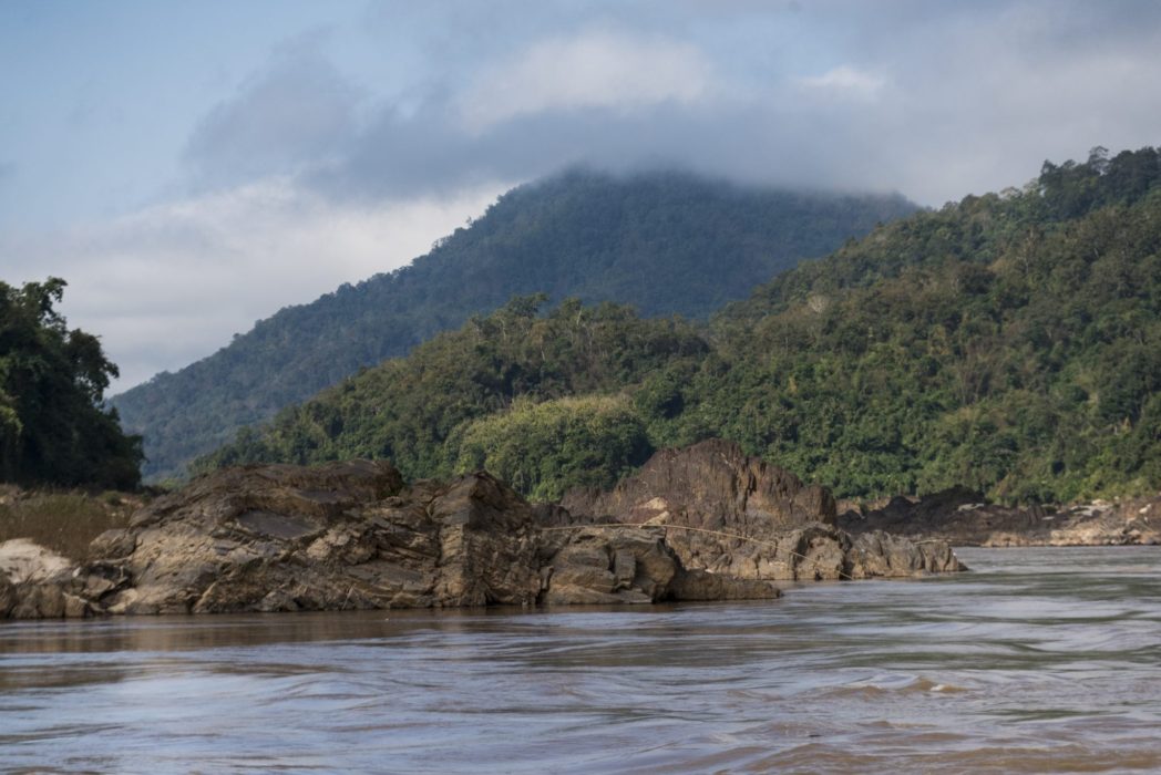 Scenic view of river flowing through mountains, River Mekong, Oudomxay Province, Laos