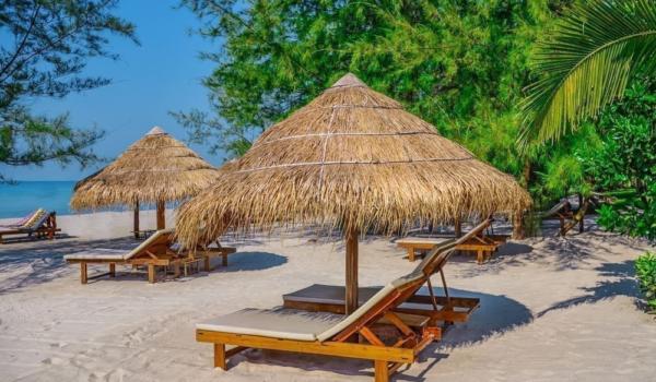 Sunbed and umbrella on Tropical beach on the island of Sihanoukv