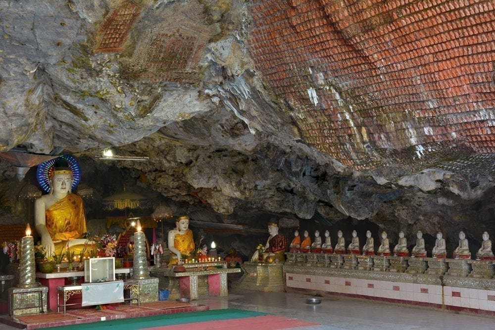 Beauiful Buddha statues inside sacred Kaw Ka Thawng Cave in Hpa-