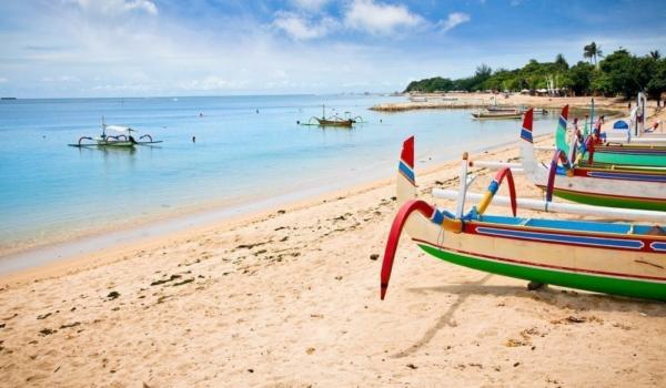 Traditional fishing boats on a beach in Nusa Dua on Bali.