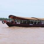 Wooden tourist boat on Can Tho River