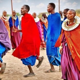 Masai warriors dancing traditional jumps tanzania